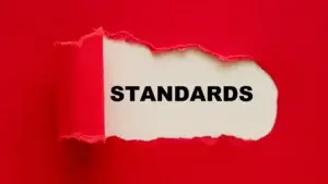 Red background torn in the middle revealing the word "standard"